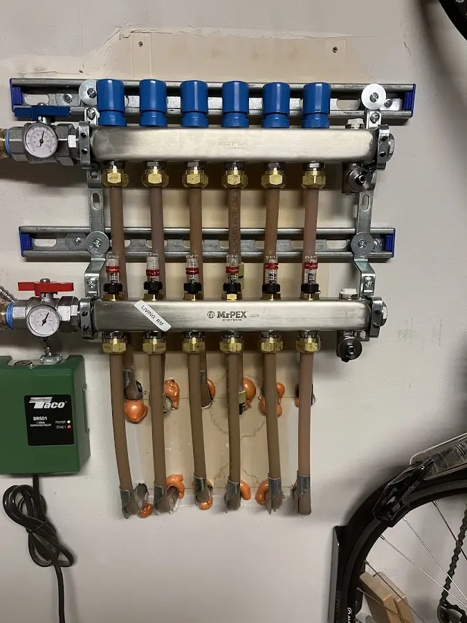 Plumber performing Leak Detection at a residential property in Attleboro